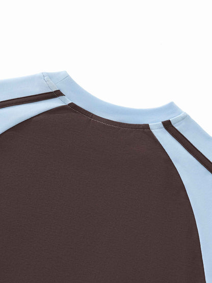 vintage looking form-fitting raglan sleeves and contrast stripe